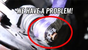 Removing the cheap control arms from my EG Hatch